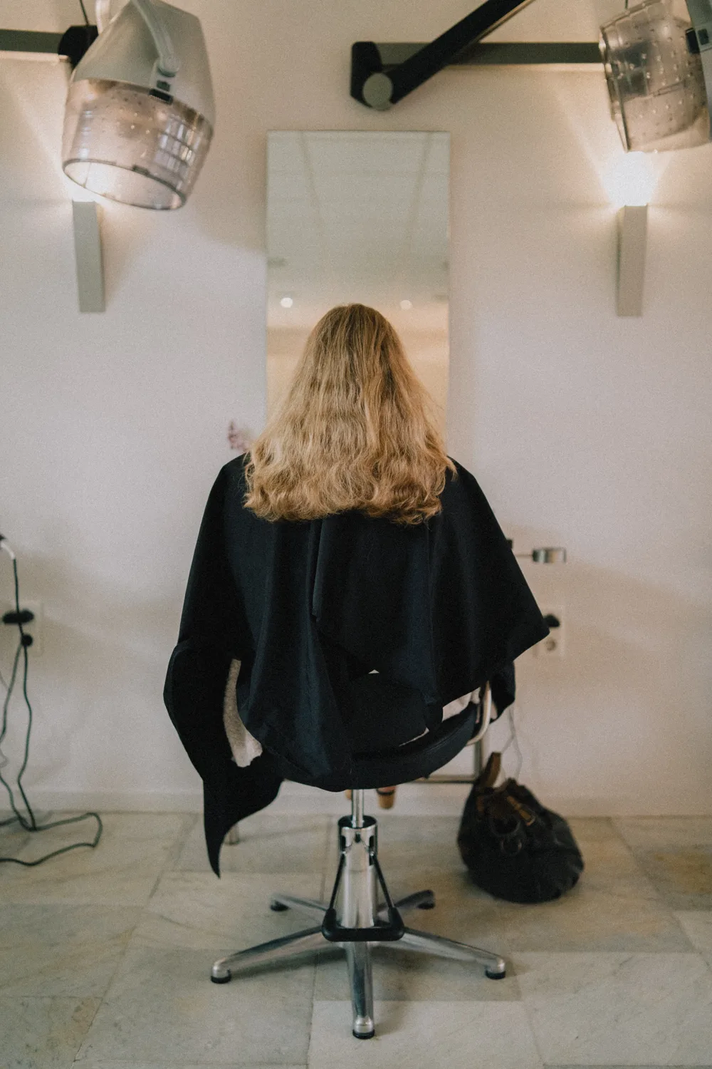 Klant in de stoel bij Kapsalon Groen